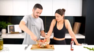 Xhulio and Kiara mixing Albanian Watermelon Feta Salad